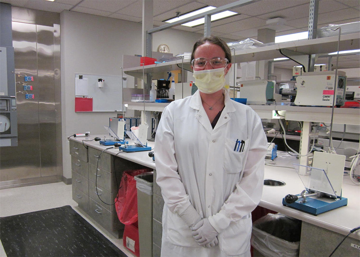 Photo of student in a lab