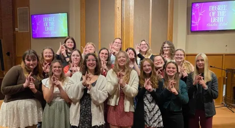 Kappa Phi Sisters celebrating new members.